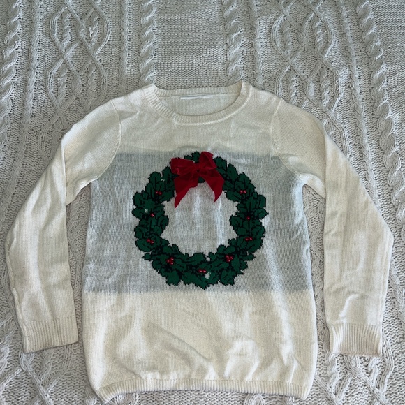 Cute White Christmas Sweater with Wreath and Holly design in white and green - Picture 2 of 8